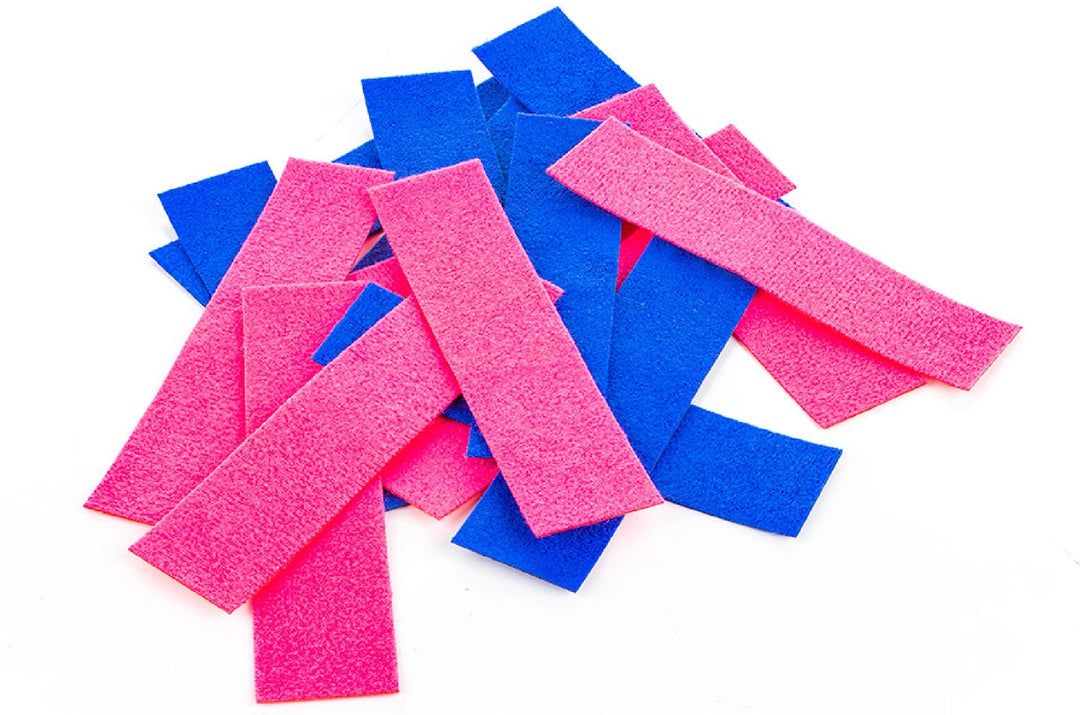 Loose pink and blue Monkey Strips felt buffers