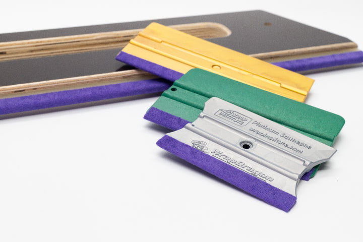 Multiple squeegees fitted with Monkey Tails buffers showing versatility